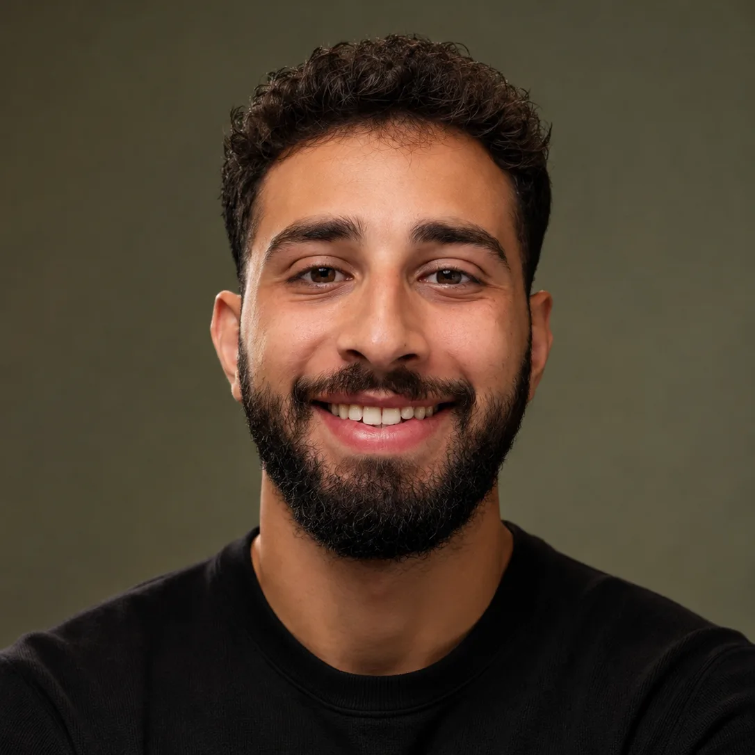 Faysal El Souki, founder of Flowcraft, smiling in a black crewneck