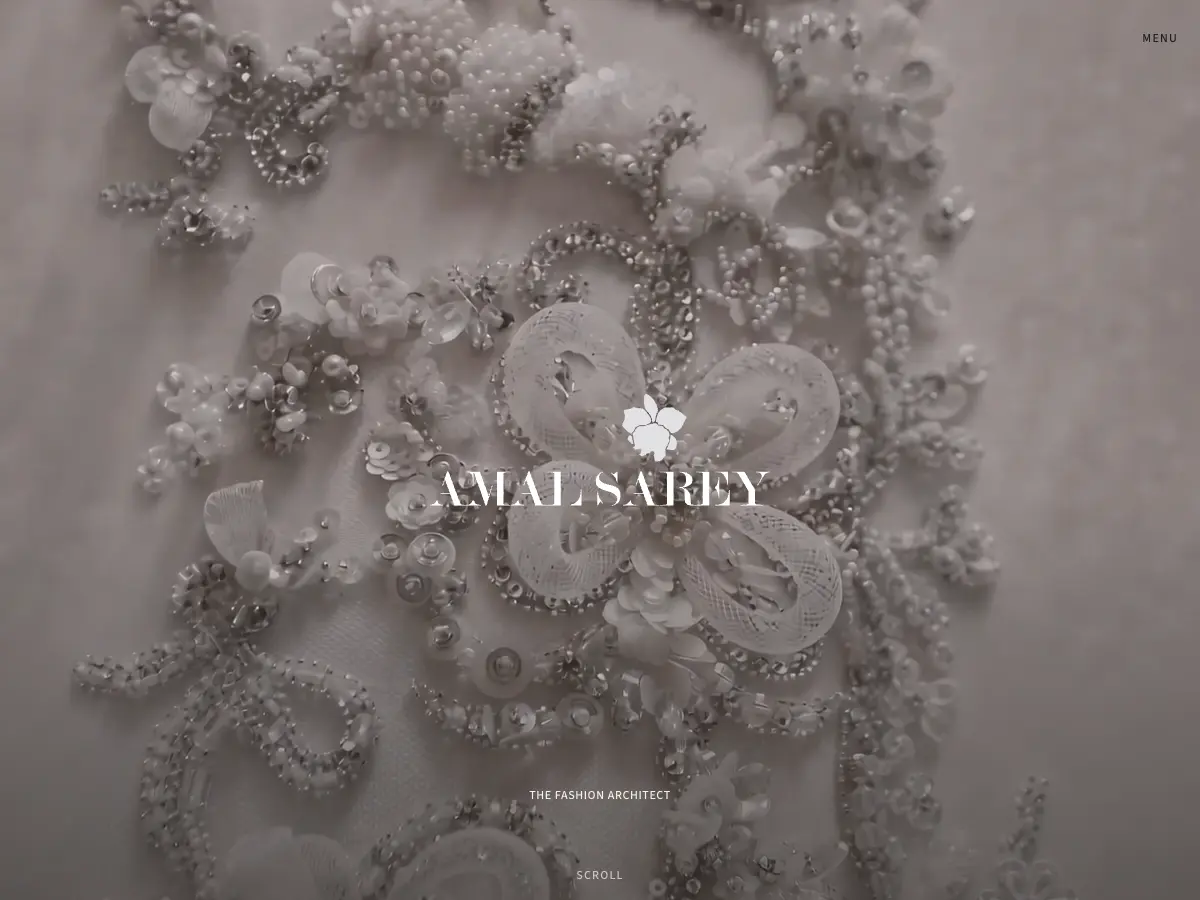 Amal Sarey homepage with hands beading an haute couture gown behind the atelier's orchid wordmark
